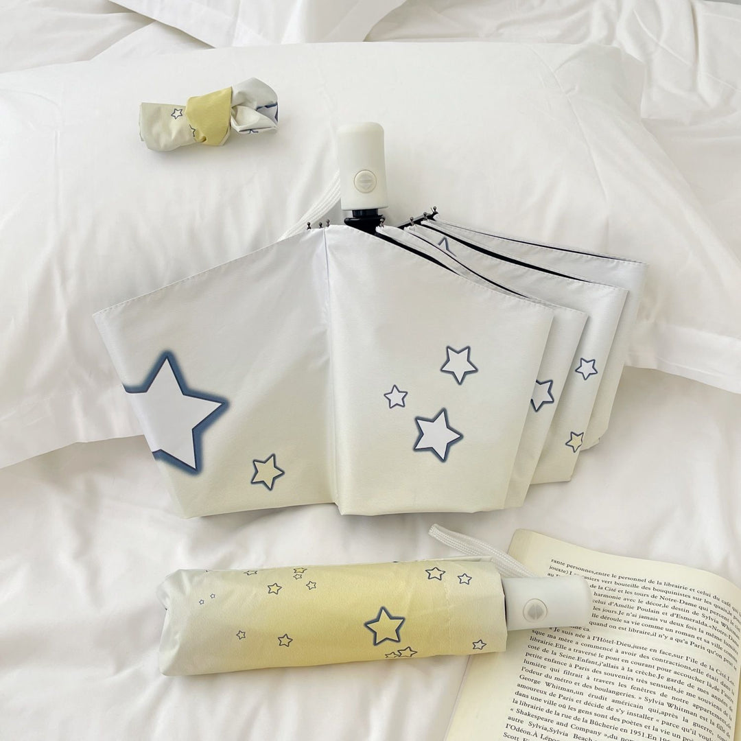 Women's compact folding umbrella with star pattern Stornfield