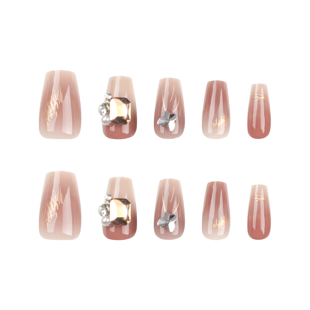 Artificial nail art with elegant jewelry accents Stornfield