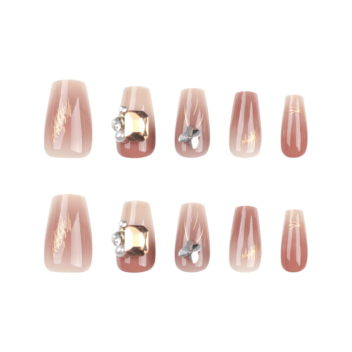 Artificial nail art with elegant jewelry accents Stornfield