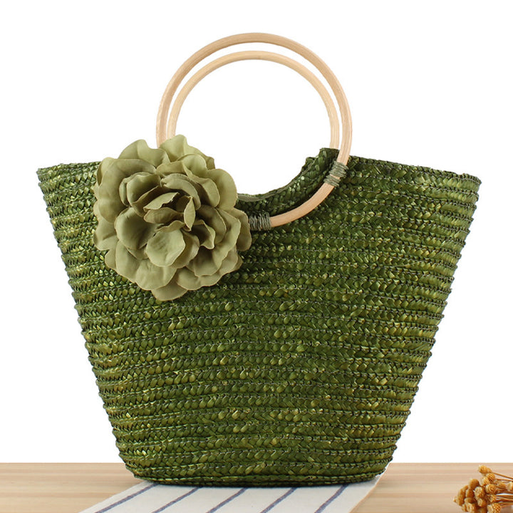 Braided straw bag with floral accent Stornfield
