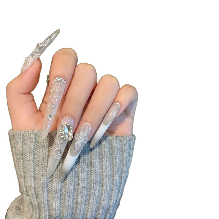 Decorative Stiletto Press-On Nail Art Set with Elegant Lace and Gemstone Accents Stornfield