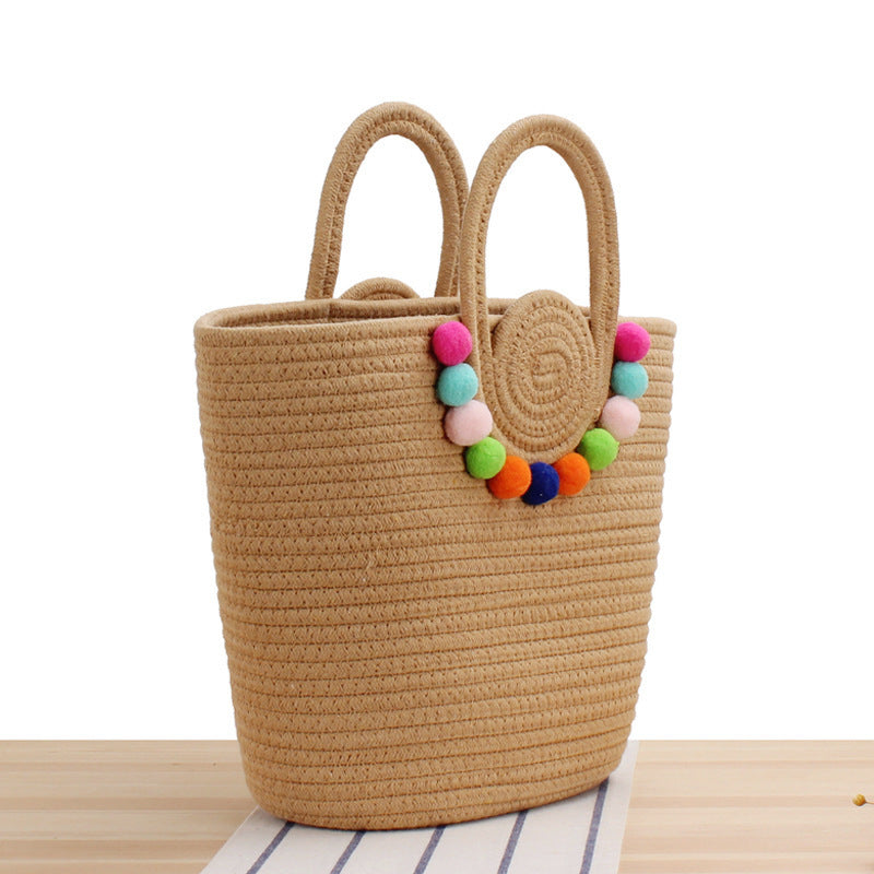 Playful beach bag with colorful pompom decor Stornfield