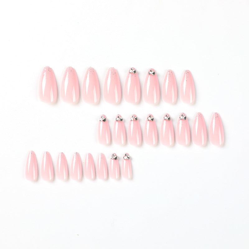 Elegant Nail Art with Glitter and Rhinestone Decorations Stornfield