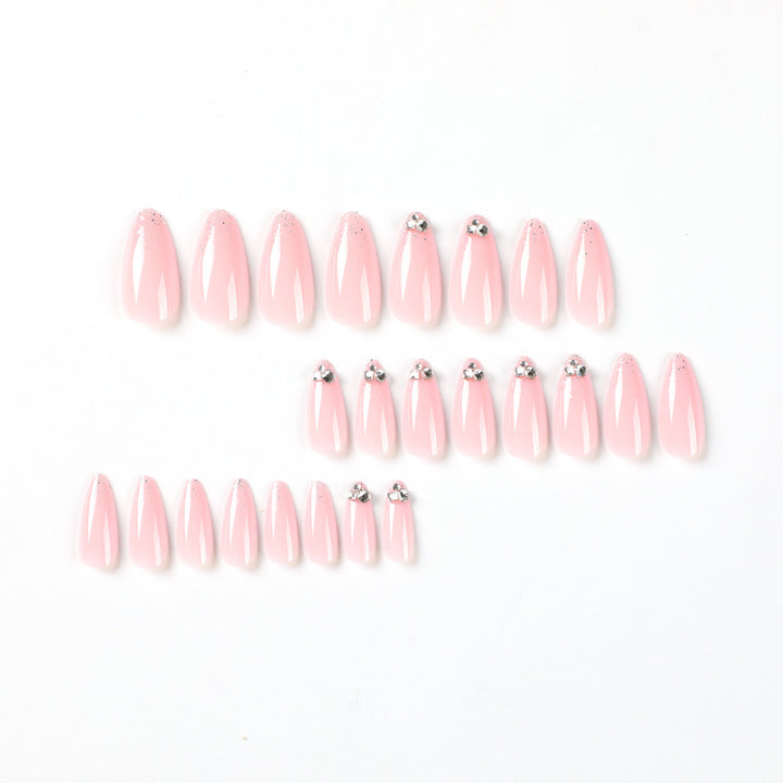 Elegant Nail Art with Glitter and Rhinestone Decorations Stornfield
