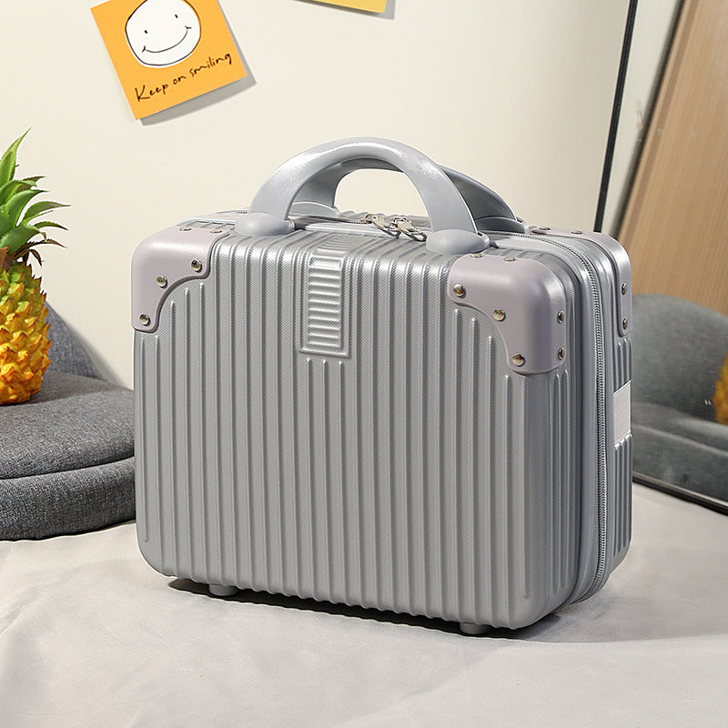 compact hard-shell travel vanity cosmetic and tech organizer with ribbed shell reinforced corners removable padded insert Stornfield