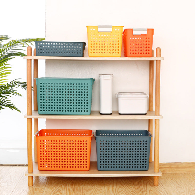 Flat plastic storage box with perforated side wall and grip recesses