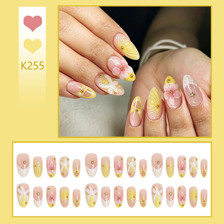 Artificial nails with floral glitter pattern Stornfield
