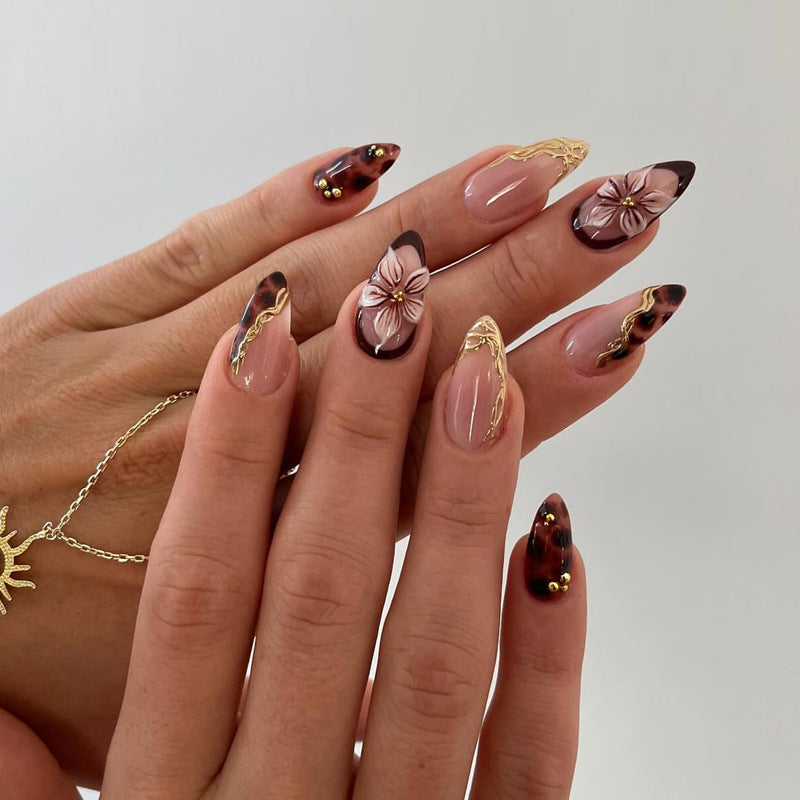 Decorative Stiletto Press-On Nails with Floral and Gold Accents Stornfield