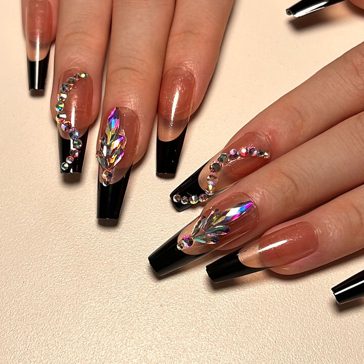 Artistic stiletto nails with glitter embellishments Stornfield