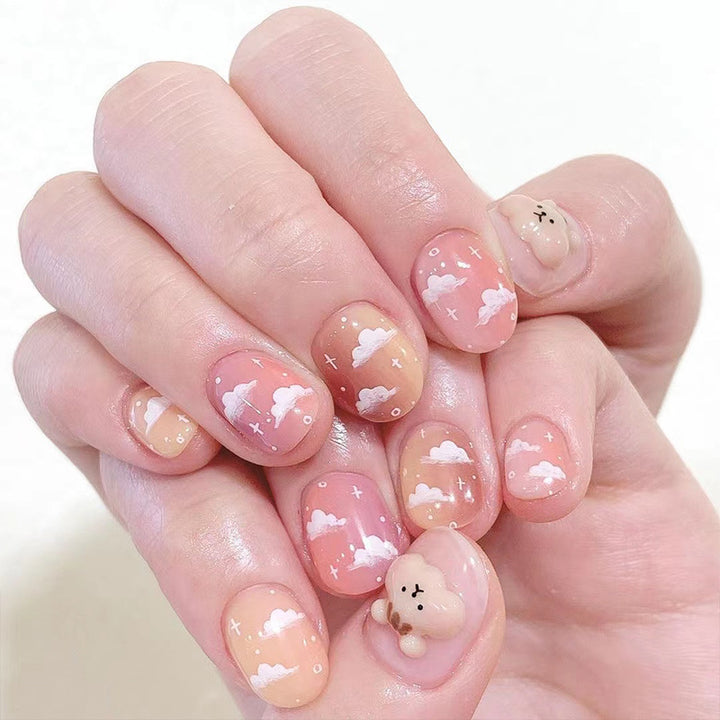 Artificial nail art with cloud design Stornfield