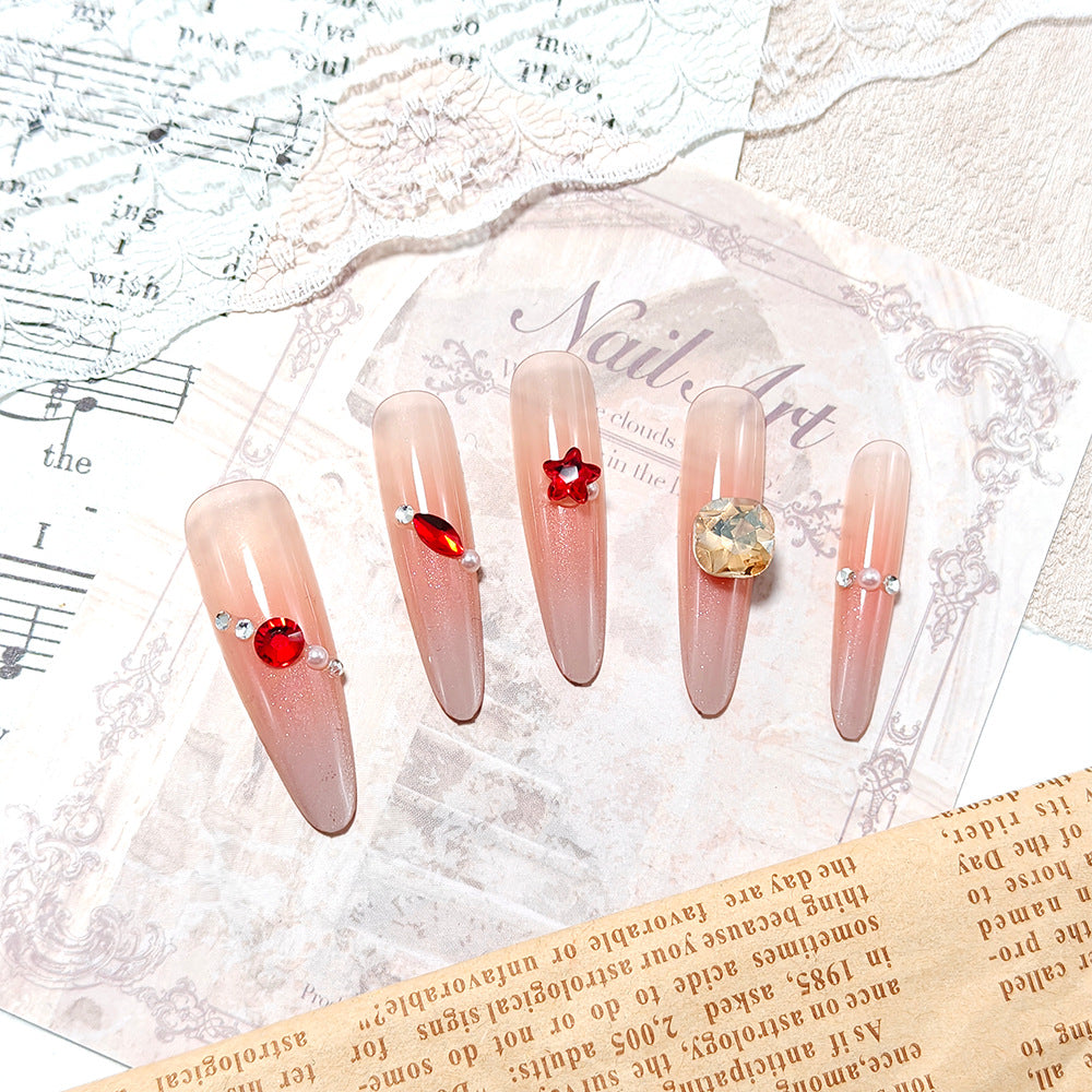 Sparkling artificial nails with decorative rhinestones Stornfield