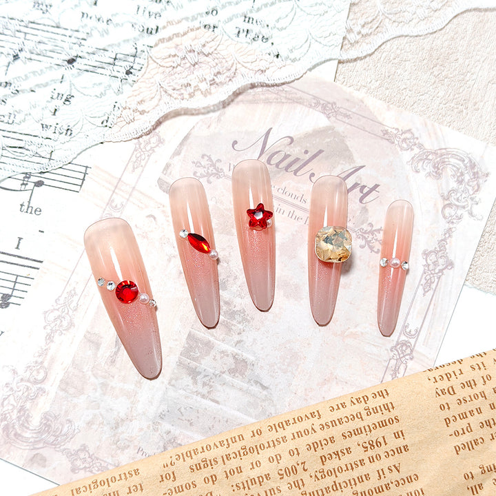 Sparkling artificial nails with decorative rhinestones Stornfield