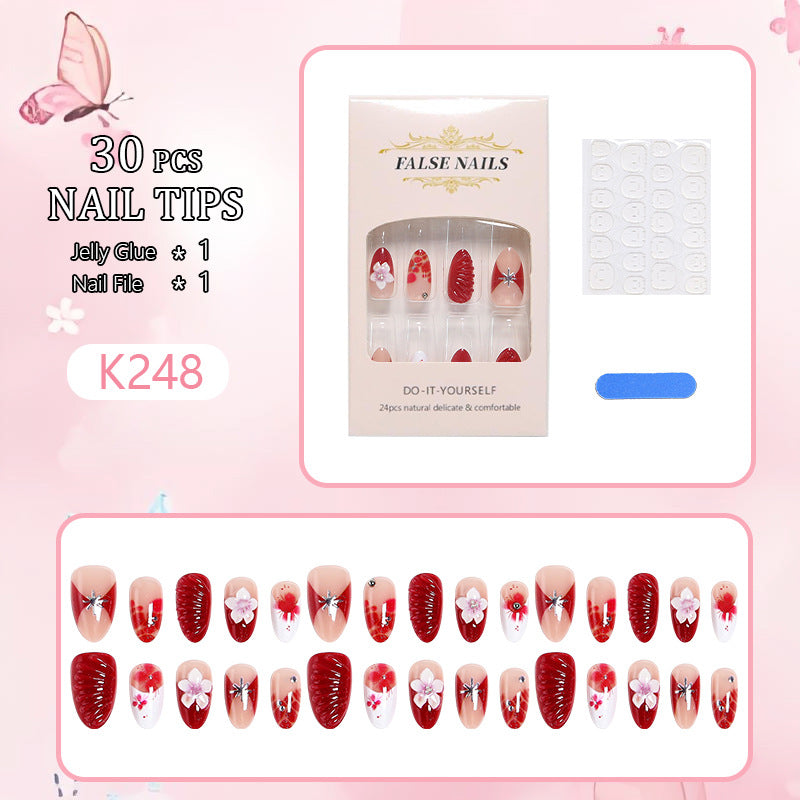 Luxury designed artificial nails with flower accents Stornfield