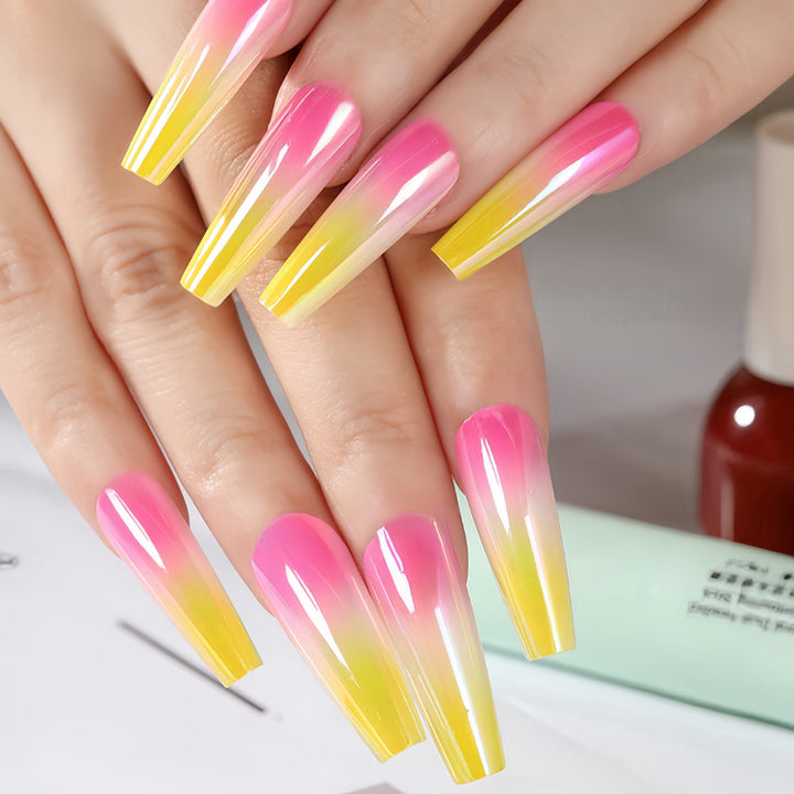 Artificial nail tips in modern ombre design Stornfield