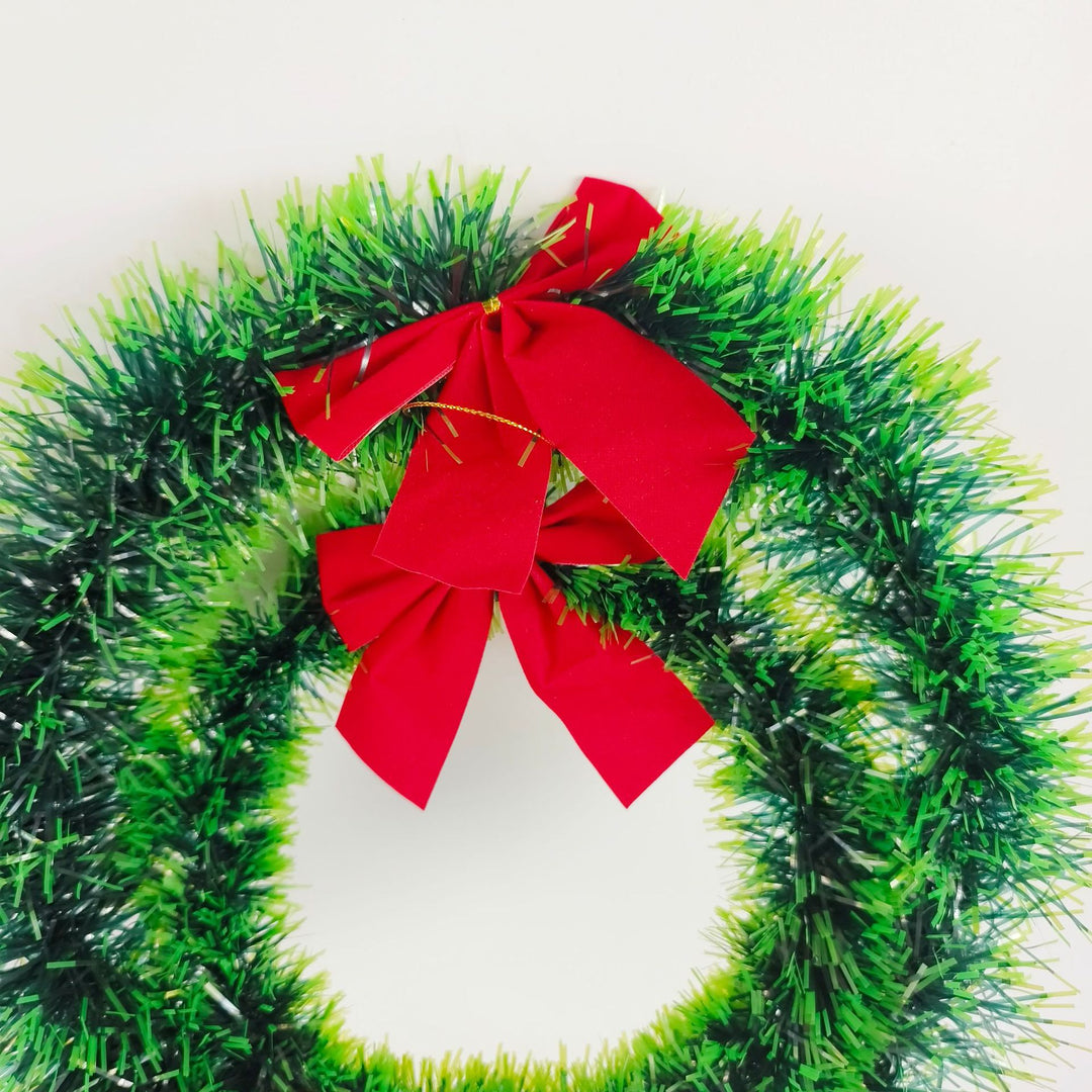 Festive Christmas wreath with ribbon