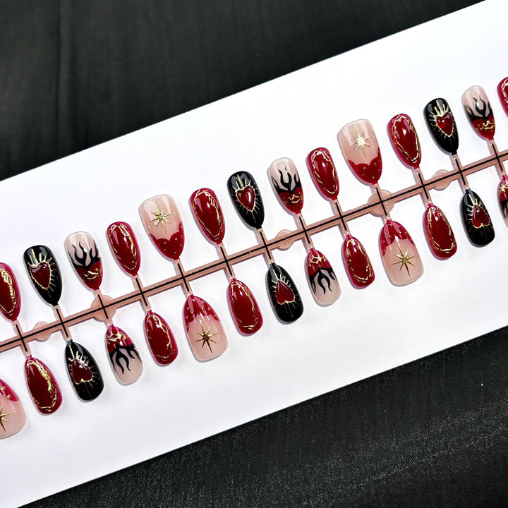 Artistic Press-On Nail Set with Heart and Flame Designs
