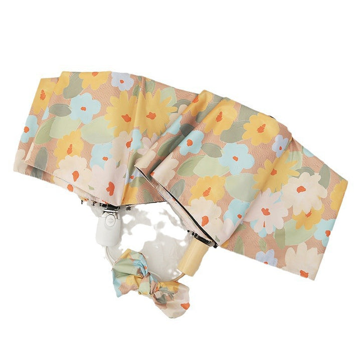 Ladies folding umbrella with creative floral pattern and automatic opening mechanism Stornfield