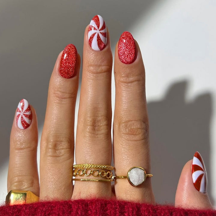 Art nail set with festive candy cane design Stornfield