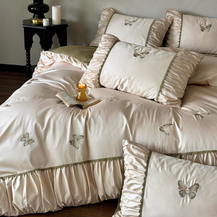 Elegant bedding set made of cotton satin with embroidered butterflies and pleated bed skirt