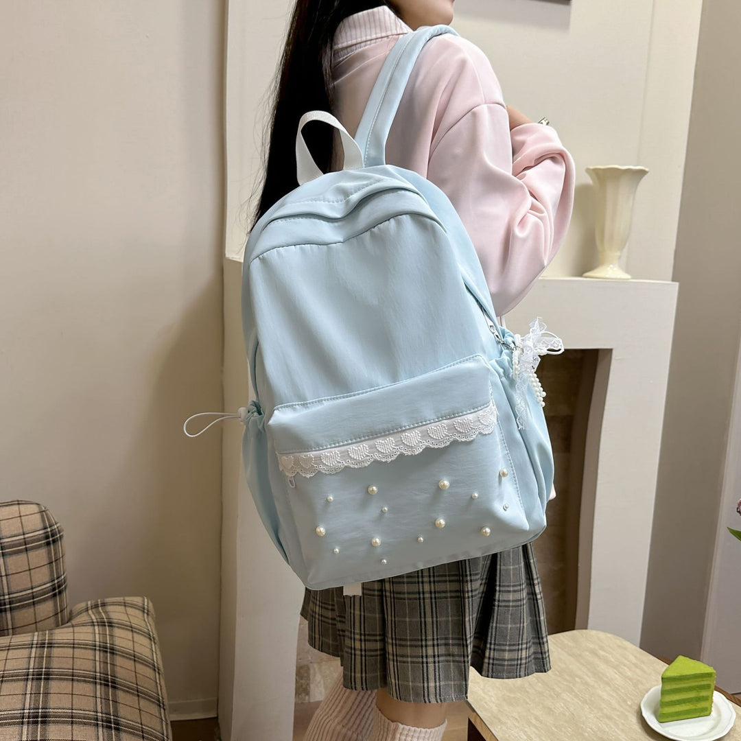 Backpack with elegant pearl applications and intricate design Stornfield