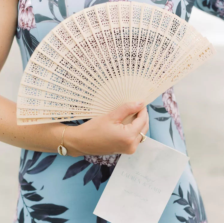 Ladies fan made of delicate plastic with artistic cut pattern Stornfield