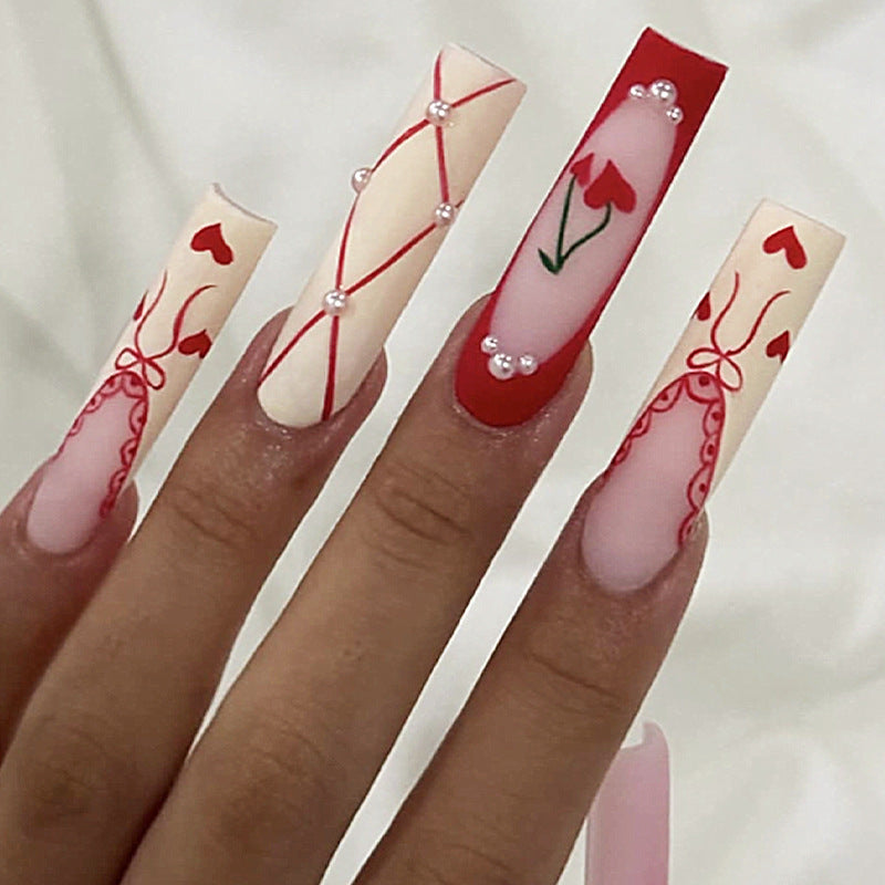 Art nail set with romantic heart and cherry motifs Stornfield