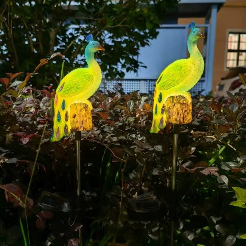 Solar-Powered Resin Peacock Garden Stake Lights With LED Glow And Weatherproof Metal Stakes Stornfield