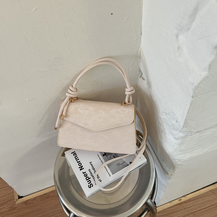 Elegant Floral Embossed Handbag