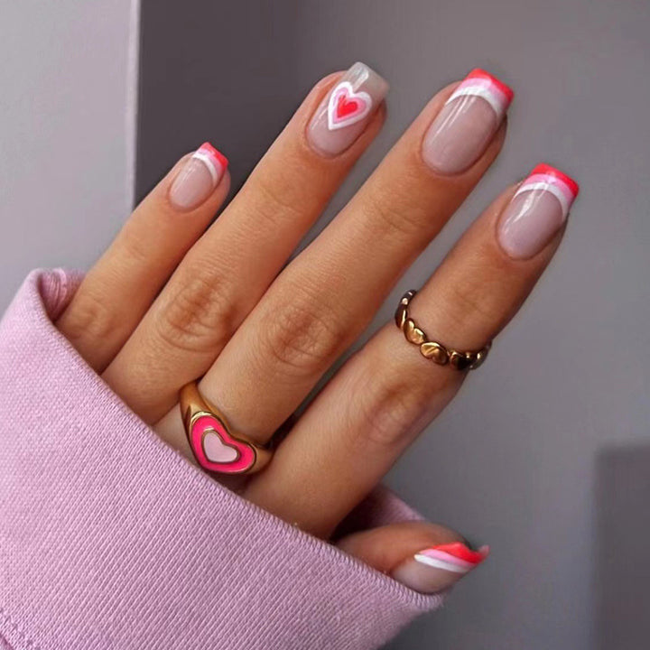 Artful nail extensions with an elegant leaf pattern Stornfield