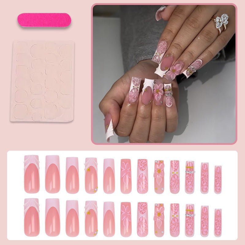 Artificial nail set with floral designs and sparkling accents Stornfield
