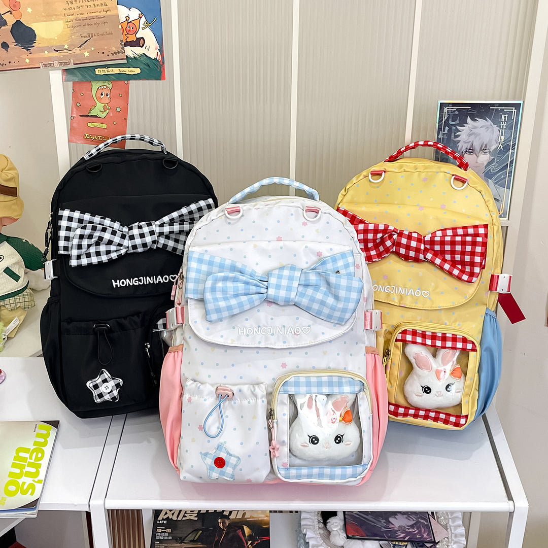 Playful Bow-Embellished Backpack Stornfield