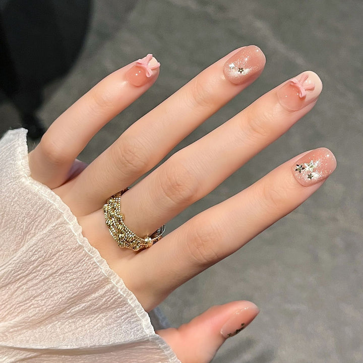 Decorative Press-On Nail Art with Floral Designs Stornfield