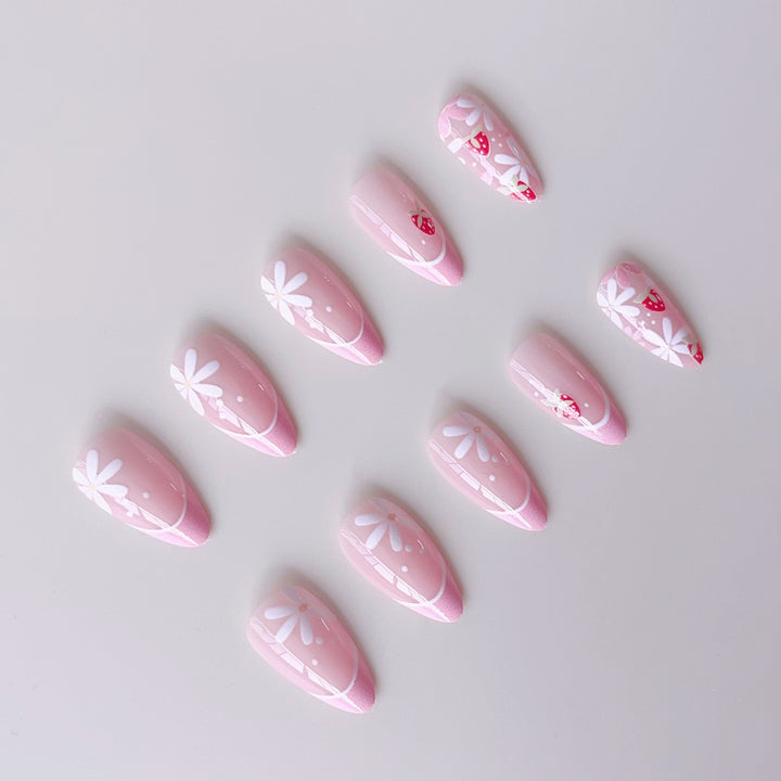 Artificial nail set with playful flower and strawberry motifs Stornfield