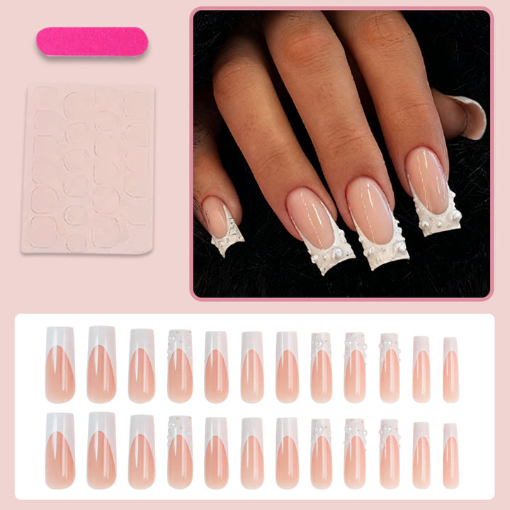 Artificial nails with elegant pearl accents Stornfield