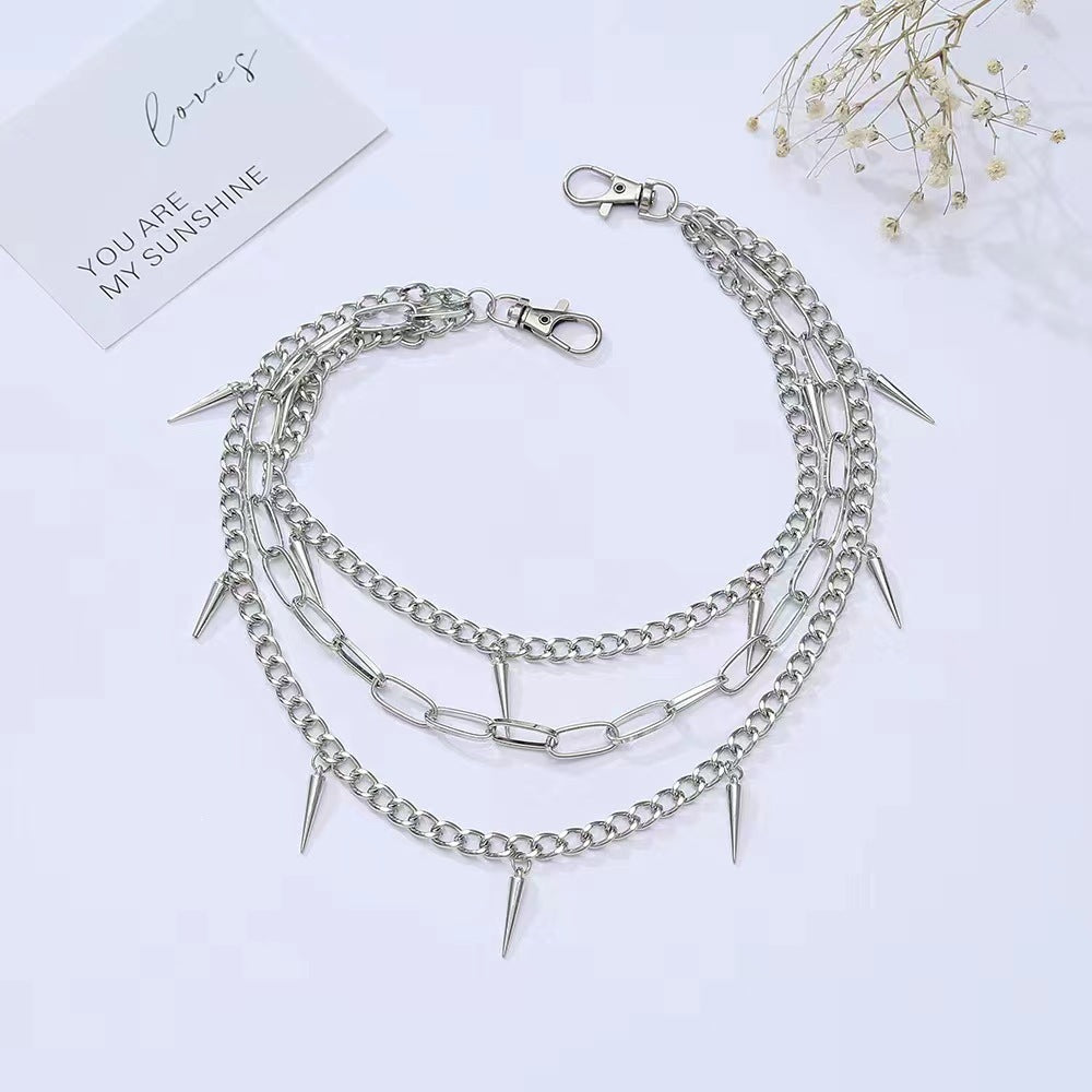 Fashionable chain belt with spiked details Stornfield