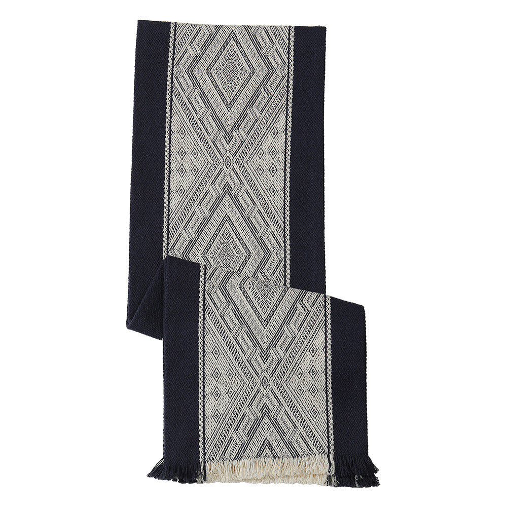 Woven table runner with geometric ethnic ornament and fringes Stornfield