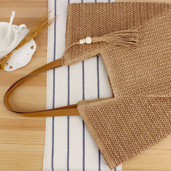 Handbag Made of Handwoven Raffia with Elegant Leather Accents Stornfield