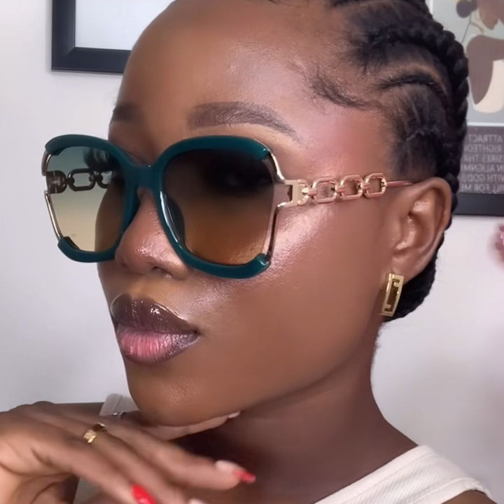 Ladies fashionable sunglasses with golden chain details Stornfield