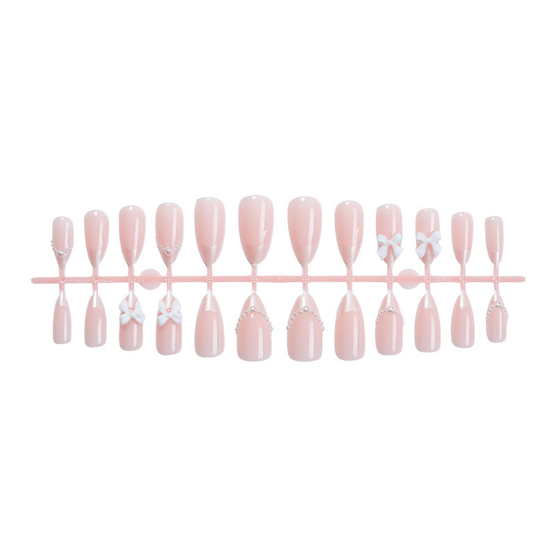 Decorative Press-On Nail Art Set with Elegant Bow and Pearl Accents Stornfield