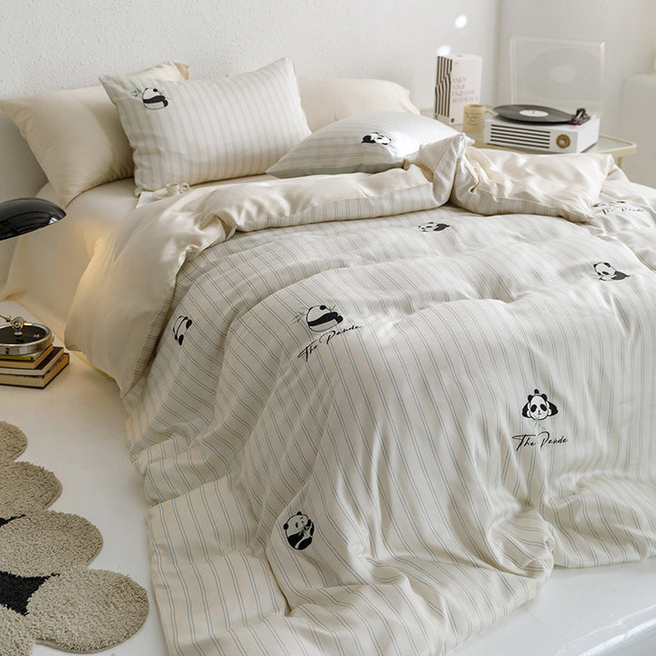 Reversible bedding set made of cotton percale with finely embroidered breakfast motifs
