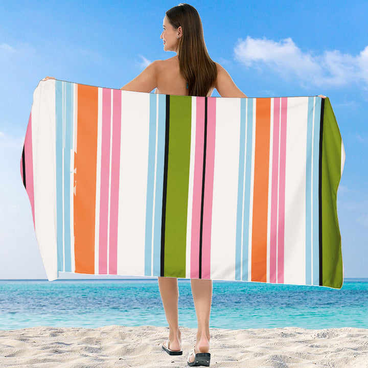 Beach towel with vibrant gradient color and stylish striped design Stornfield