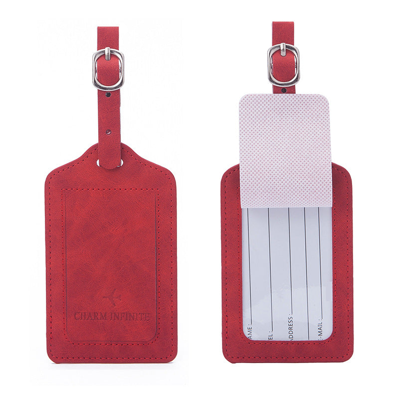 vintage leather luggage tag with transparent ID window and adjustable buckle strap Stornfield