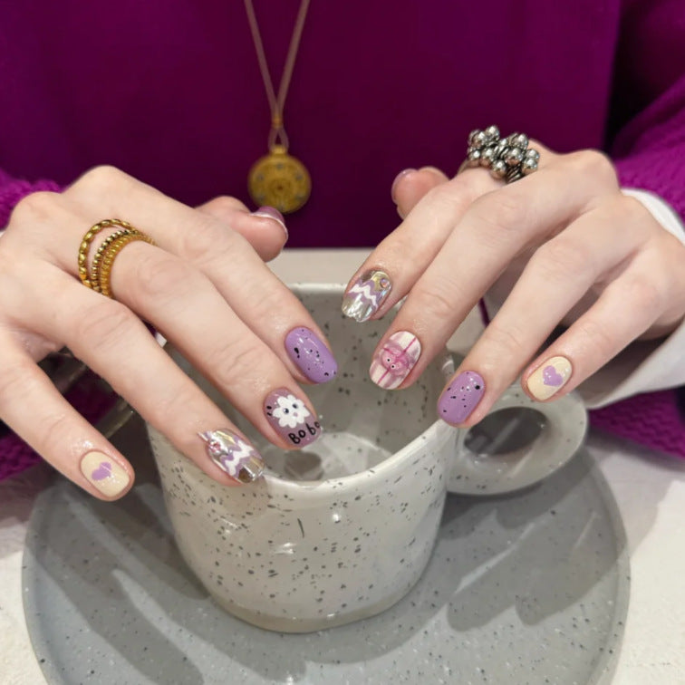 Playful Cartoon-Themed Press-On Nail Art Set Stornfield
