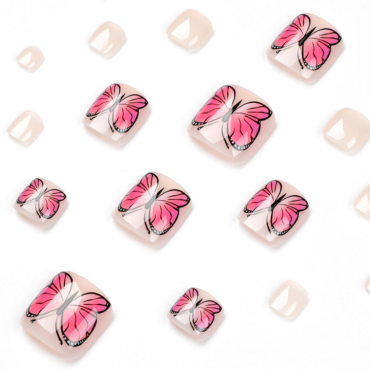 Artful toenail design with butterfly design Stornfield