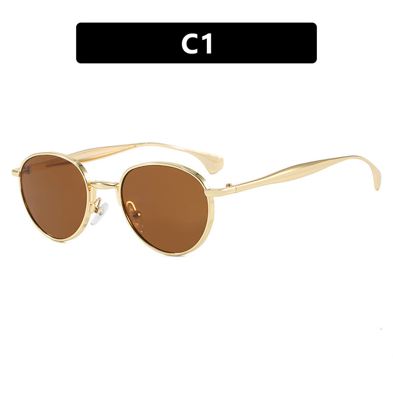 Women's round sunglasses with elegant metal frame and UV protection Stornfield