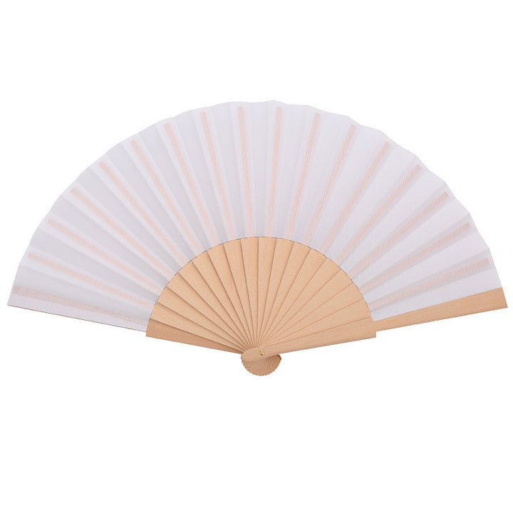 Ladies folding hand fan made of airy material with intricate folds Stornfield