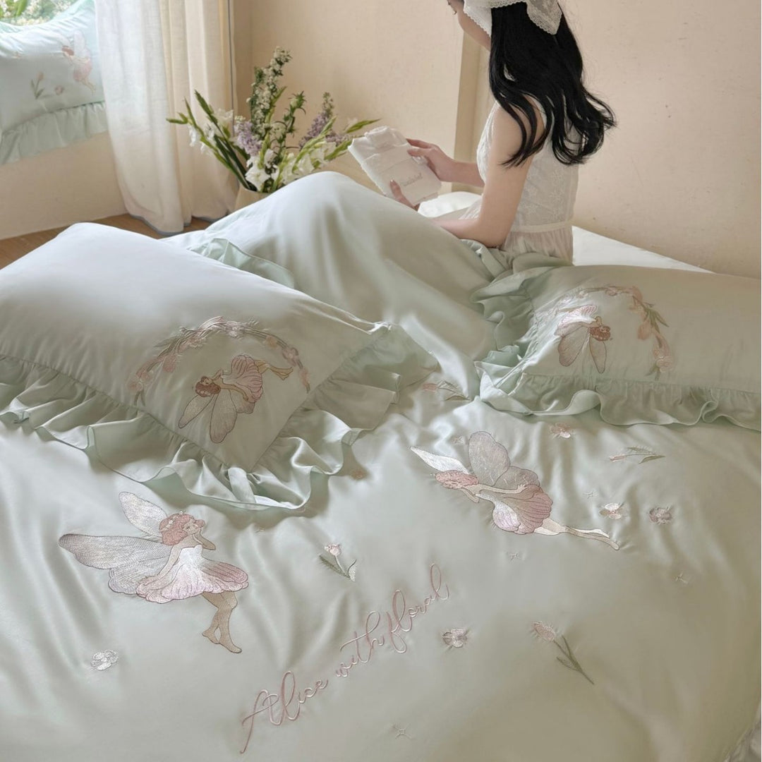 Satin bedding set with embroidery and ruffled hem