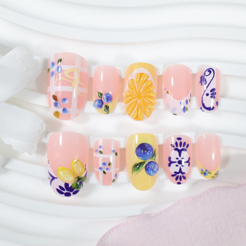 Nail art set with elegant fruit and flower patterns Stornfield