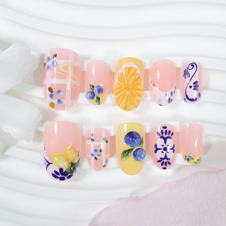 Nail art set with elegant fruit and flower patterns Stornfield