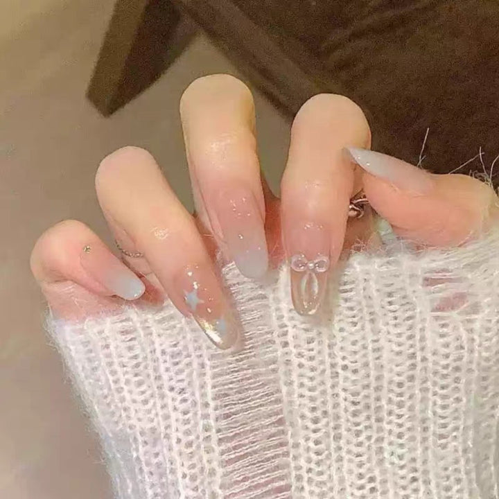 Artistic Press-On Nail Set with Glitter and Floral Accents Stornfield